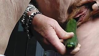 oma stuffs cucumber deep in her hairy german granny beaver??