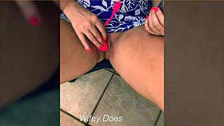 wife slides lush toy deep into shaved pussy on outdoor balcony