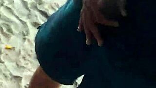 exhibitionist couple fucks on beach as stranger cums