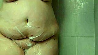 Hey, watch her tease those big tits in shower