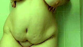 Hey, watch her tease those big tits in shower