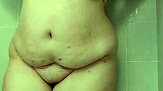 Hey, watch her tease those big tits in shower