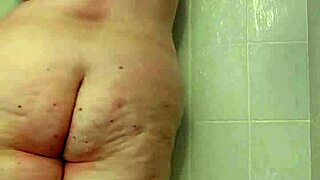 Hey, watch her tease those big tits in shower