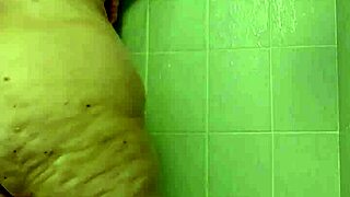 Hey, watch her tease those big tits in shower