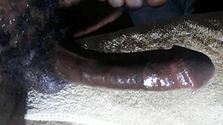 kenyan stud strokes his huge black monster cock in closeup handjob unleashing massive cum load