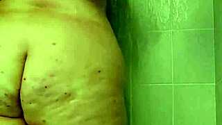 Hey, watch her tease those big tits in shower