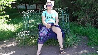 hairy mature flashes chubby pussy and fat body in see-through dress outdoors