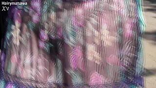 hairy mature flashes chubby pussy and fat body in see-through dress outdoors