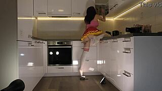 Tattooed Redhead Cheerleader Bares See-Through Panties Kitchen