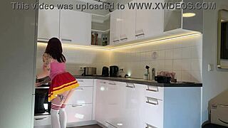 Tattooed Redhead Cheerleader Bares See-Through Panties Kitchen