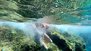steamy underwater play with busty milf by the pool