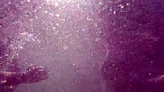 steamy underwater play with busty milf by the pool