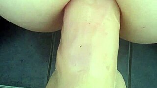 amateur shoves huge dildo deep into tight asshole stretching wide