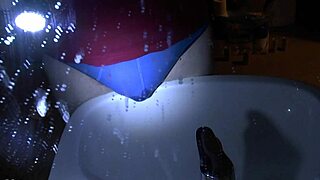 Blue underpants soaked peeing right over the sink edge.