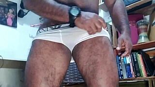 Pornstar Brasil features Kojac's huge hairy Brazilian fat cock in solo masturbation handjob with tattooed underwear tease.