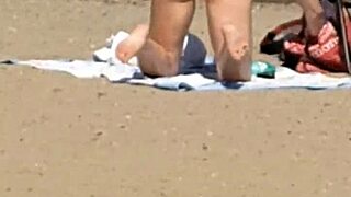 Pink princess hiding on beach, who's watching her candid moves?