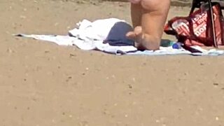Pink princess hiding on beach, who's watching her candid moves?