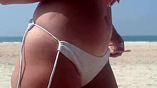 peeing in white bikini on public beach 😏 big ass fat girl outdoor