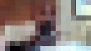 mistress fists slave's swollen balls