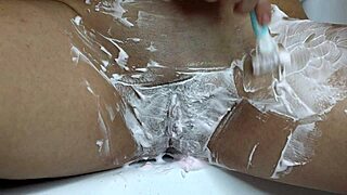 hey check out this hairy pussy getting shaved with watermelon foam in bathroom