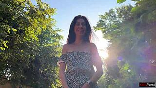 skinny teen lifts her skirt outdoors flashing her ass plug through fishnet pantyhose