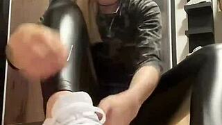 mysterious nylon-clad girl teases leather socks fetish