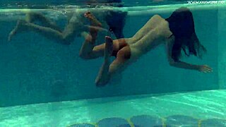 Petite Russian teen Irina Russaka dives into public underwater pool bath