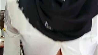 asian ladyboy in hijab strokes her cock solo on camera